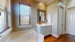 Master Bathroom with Two Vanities, Jetted Tub and Standalone Shower